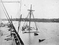 USS Vandalia sunk to the nettings, alongside USS Trenton from which deck the photograph was taken a few days after the Samoa Hurricane of 1889.
